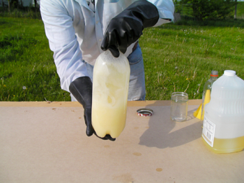 Allow the bottle to stand for an hour. Mixture will begin to clear almost immediately